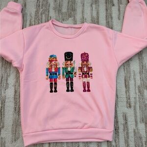 Pink Sweatshirt with Nutcracker Design
